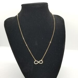pave rhinestone infinity necklace on gold tone chain